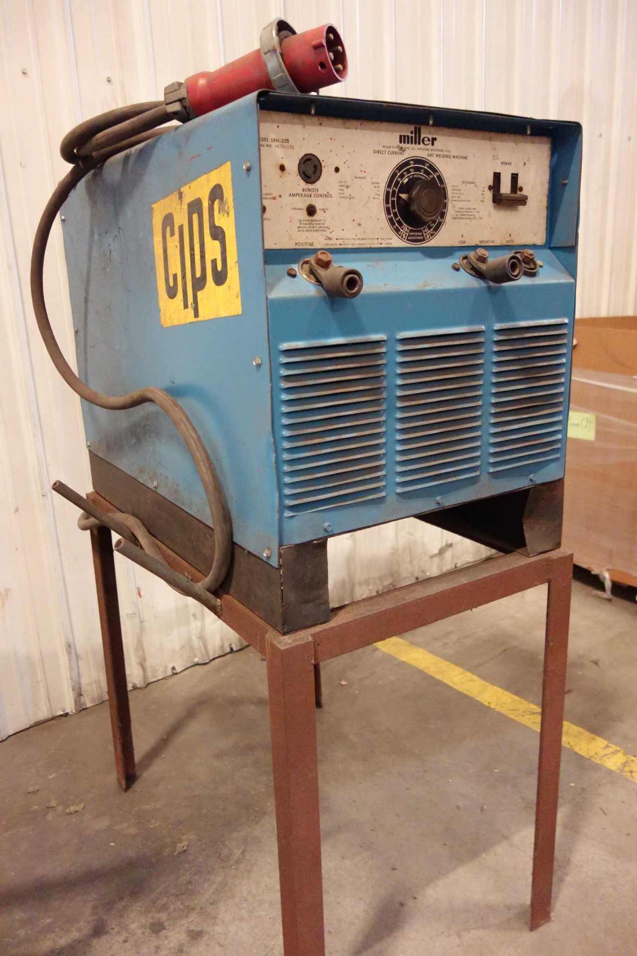 MILLER DC MULTIPROCESS WELDER ON STAND - WELDING EQUIPMENT
