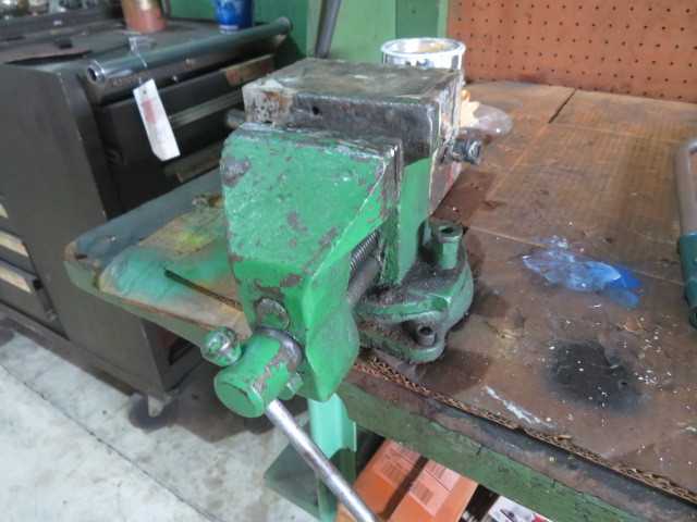 Vice and Baldor grinder with table, but no contents on table - MISCELLANEOUS