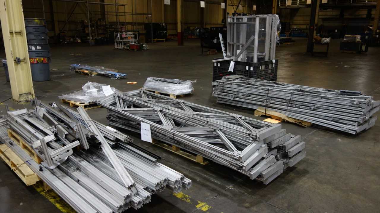 6 PALLETS OF ALUMINUM RACKING TRACKS - MATERIAL HANDLING