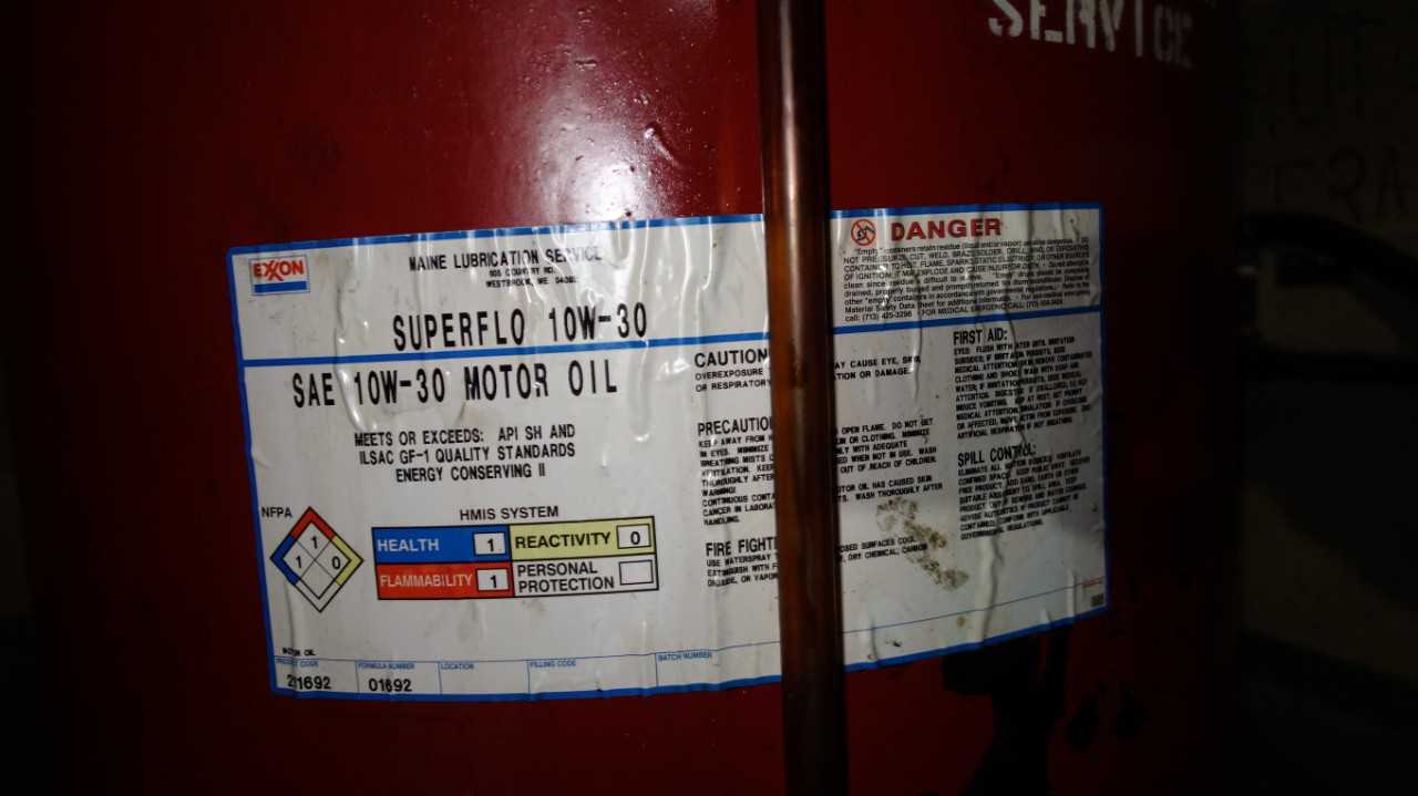 LOT OF 2 LUBRICATION OIL DRUMS W/ EXXON 10W-30 OIL - ELECTRIC POWER TOOLS
