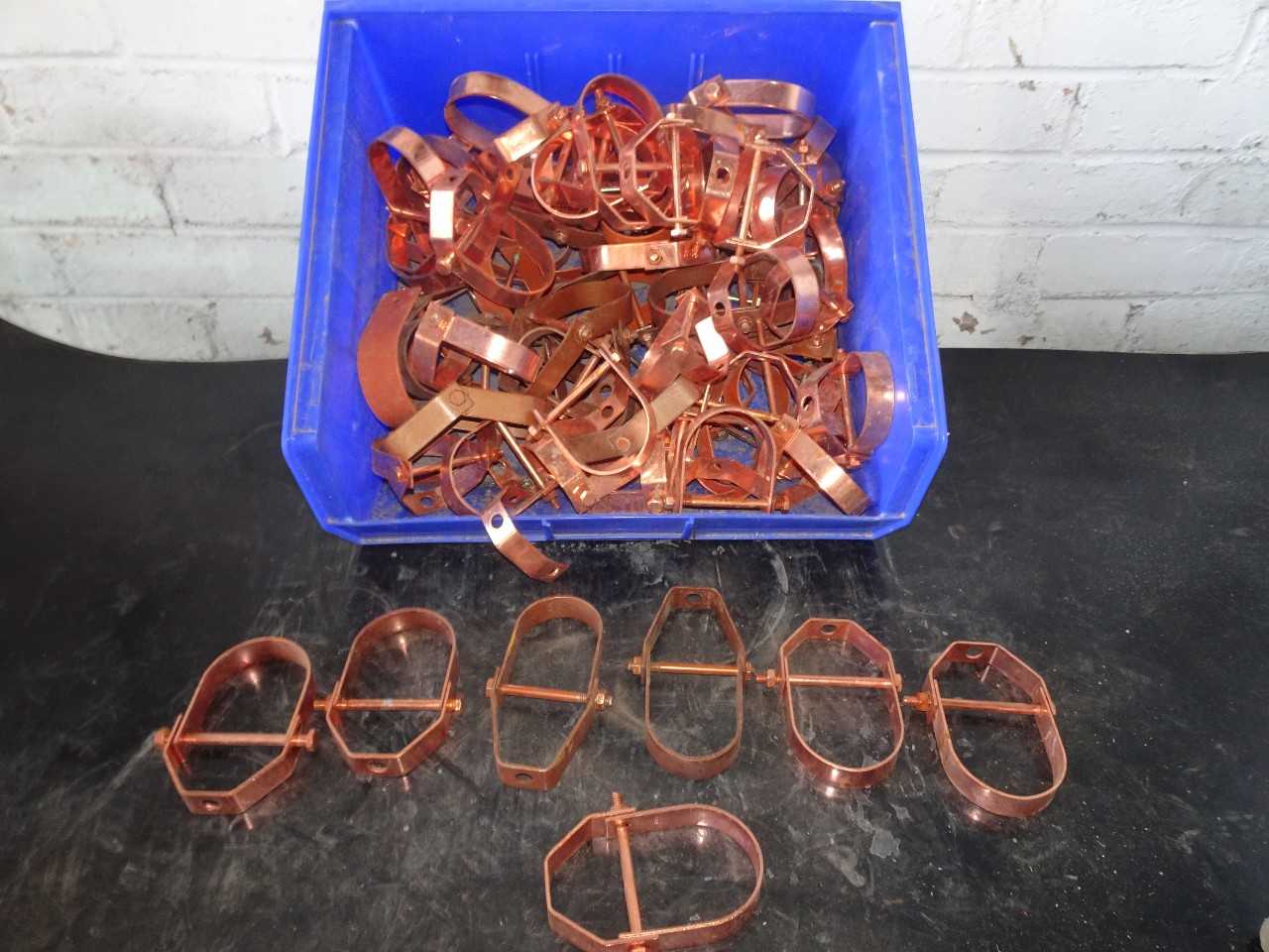 Approx 50 2in copper pipe hangers - WIRE MANUFACTURING