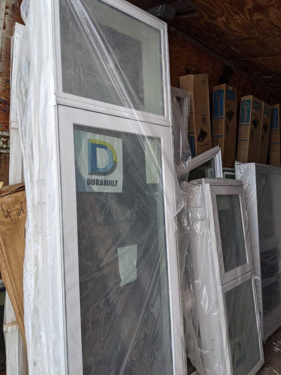 Full trailer load of various size new windows and doors - MISCELLANEOUS