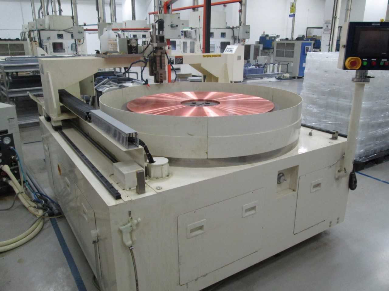 Fujikoshi PFM 19 Copper Table Facing & Grooving Machine - MACHINING EQUIPMENT