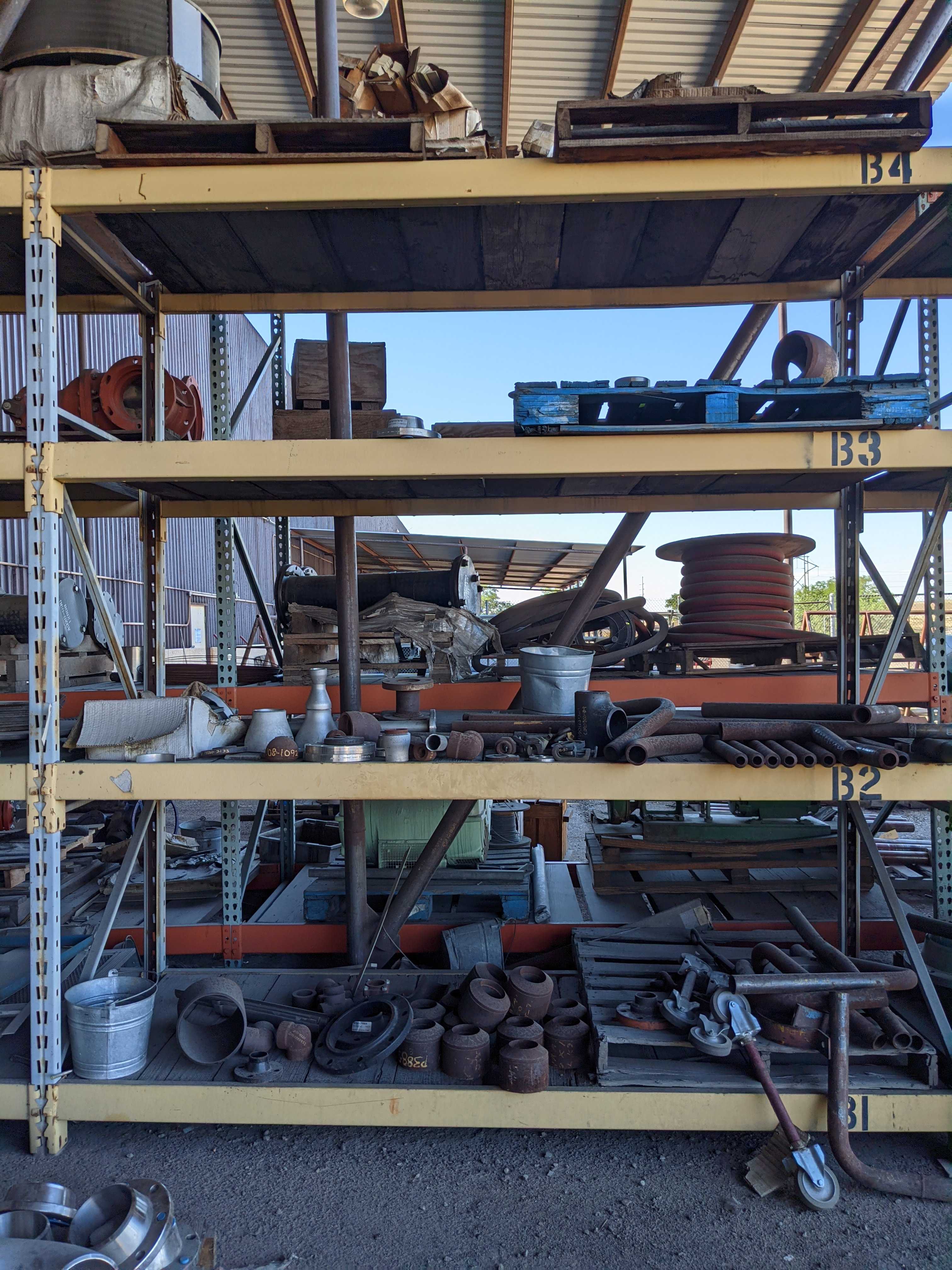 TWO RACKS AND FLOOR - INDUSTRIAL PARTS