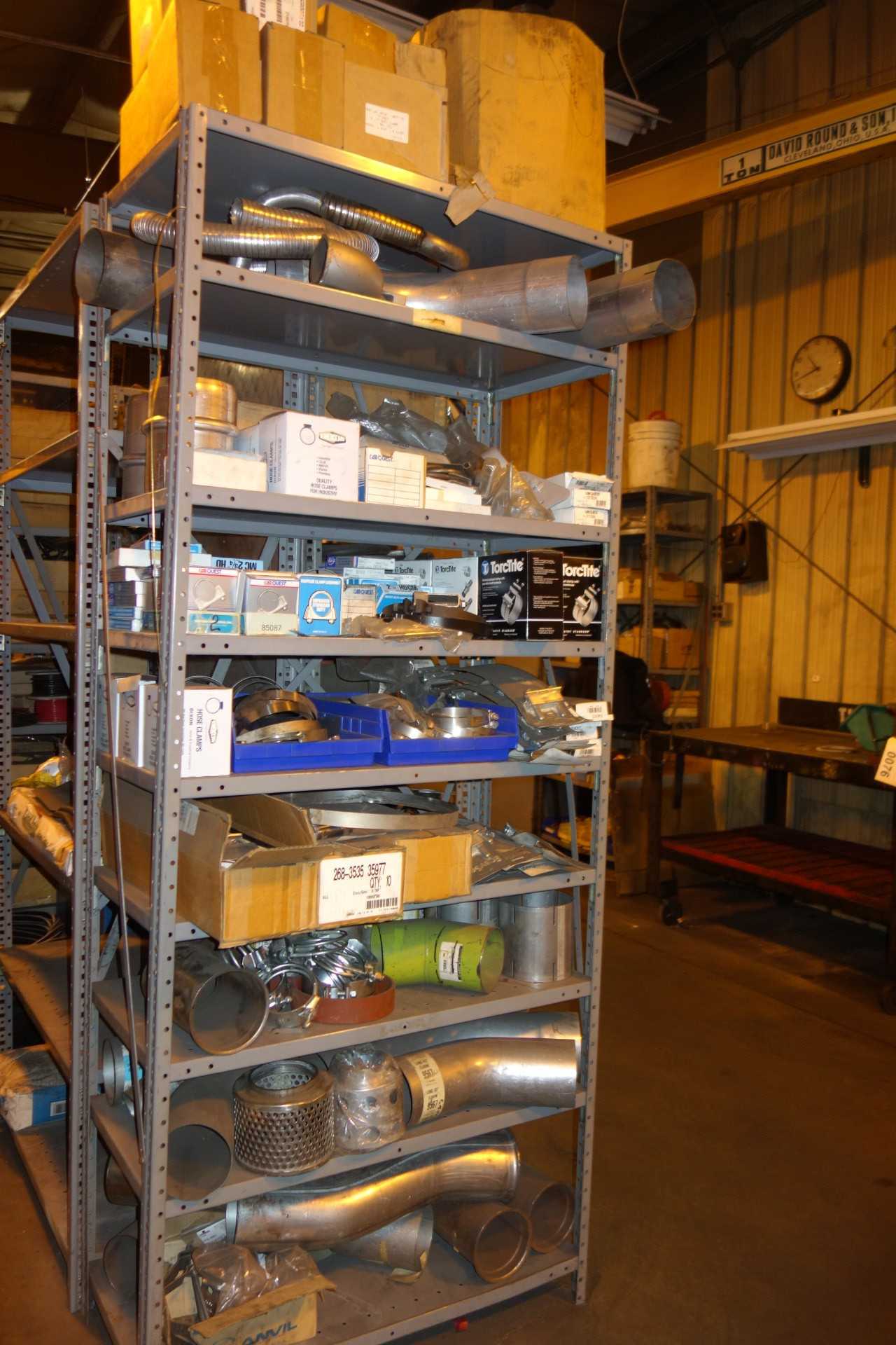 CONTENTS OF SHELVING, ASSORTED CLAMPS & ELBOWS - SHELVING