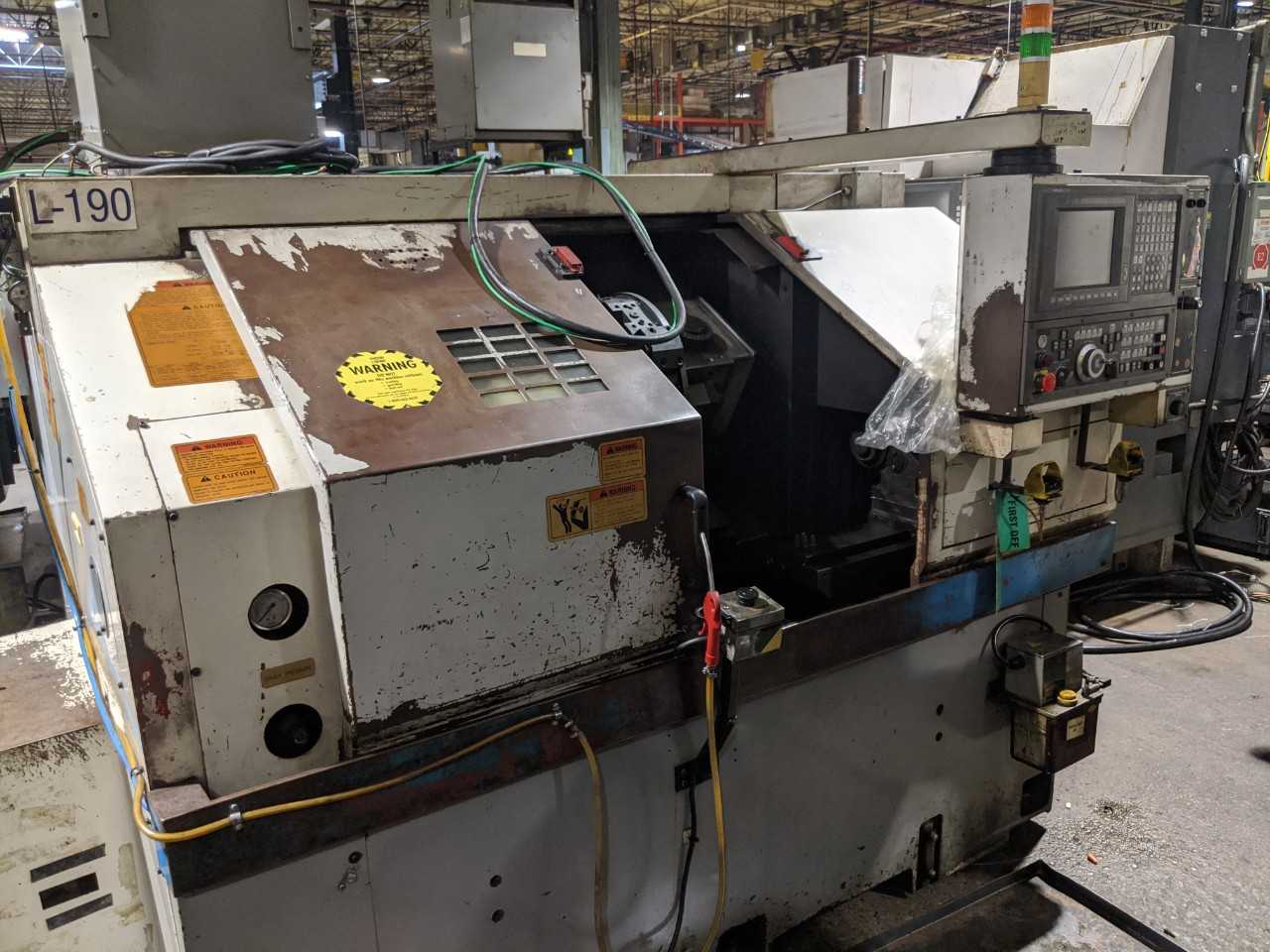 2002 OKUMA ES-L10 CNC TURNING CENTER - CNC LATHES