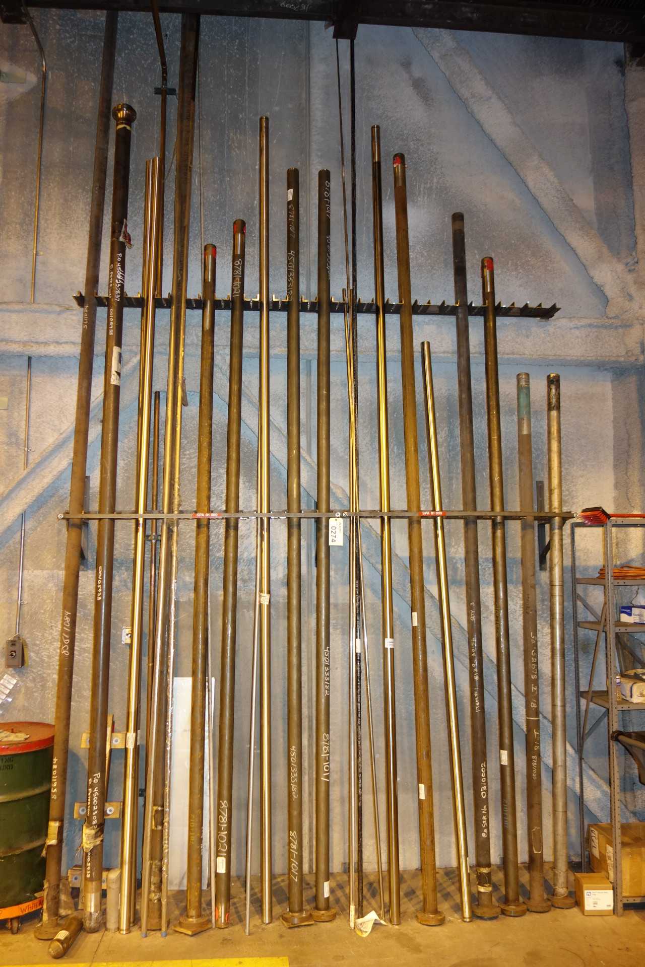 WALL OF ASSORTED BOILER TUBES, PIPES - INDUSTRIAL PARTS