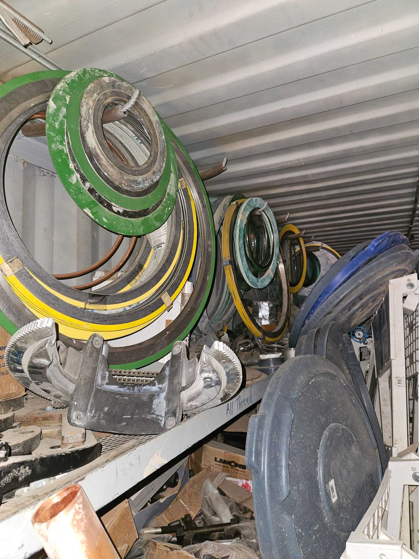 20' SHIPPING CONTAINER WITH PIPE MATERIALS AND TOOLS - TOOL STORAGE