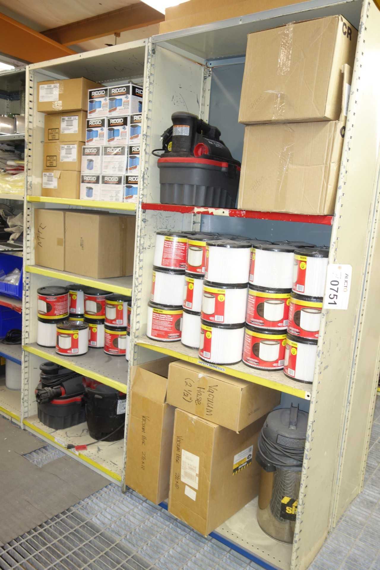 Contents of 2x sections shelving - vacuums, vacuum air filters - SHELVING