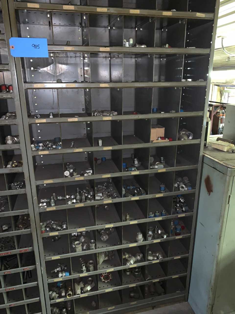 Large wall unit filled with fittings - INDUSTRIAL PARTS