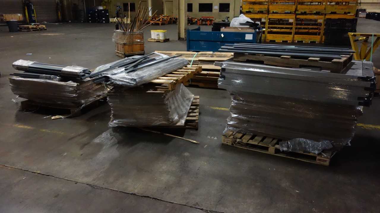 3 PALLETS OF ASSORTED OFFICE FURNITURE SUPPLIES, CUBICLE WALLS, STEEL RACK SECTIONS, WOODEN TABLE BOARDS - PLANT & FACILITY