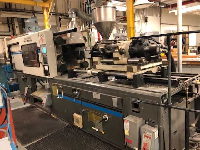 Cincinnati Milacron; Inc Molding Press - CNC MACHINING CENTERS