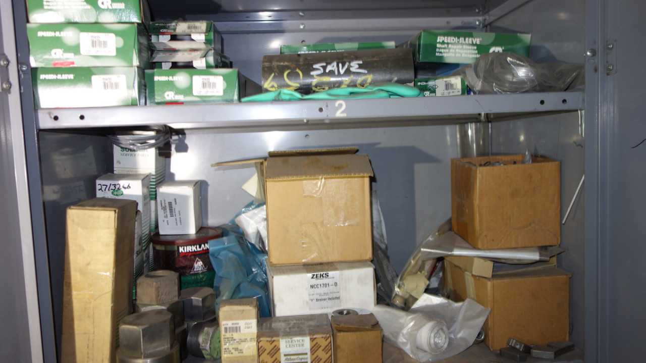 CONTENTS OF CABINET WITH SPARE PUMP PARTS - MISCELLANEOUS