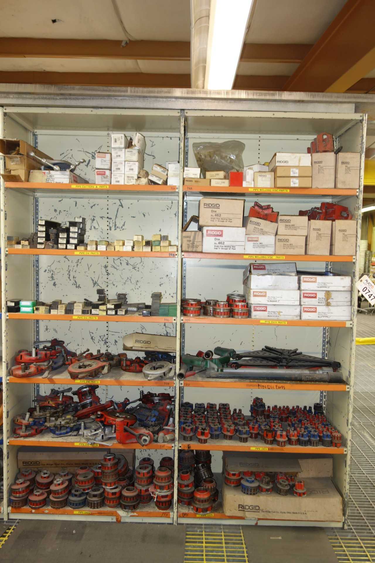 Contents of 2x shelving - Ridgid pipe threaders, pipe cutters, pipe die parts - HAND TOOLS