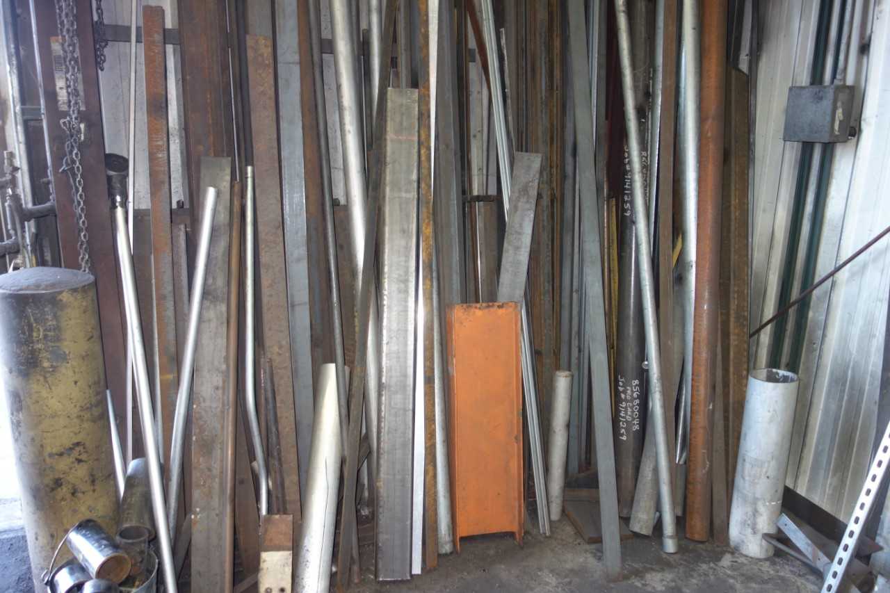 WALL OF ASSORTED STEEL, PIPING - TOOL STORAGE