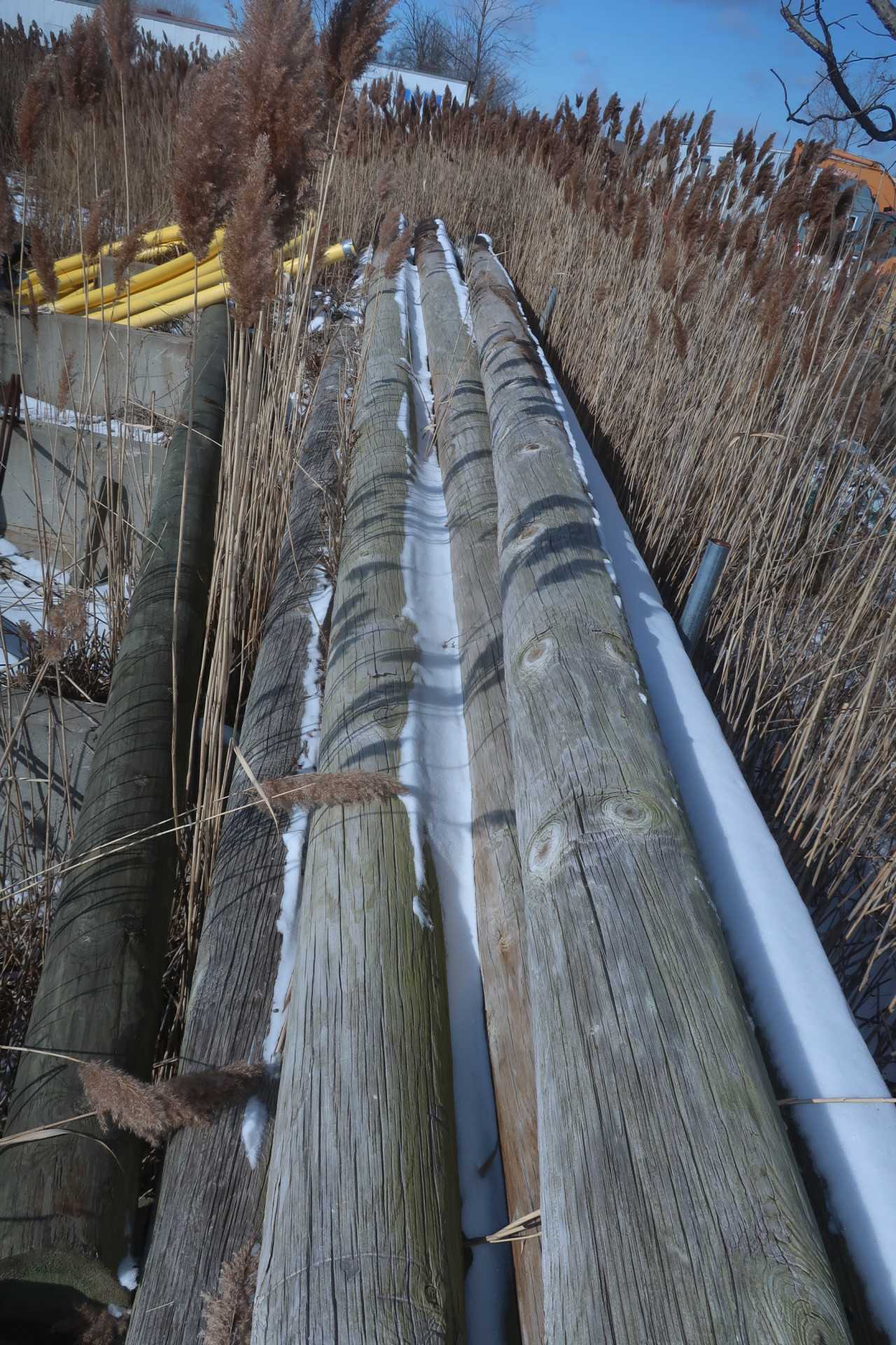LOT OF ASSORTED TELEPHONE POLES - TRAILER MOUNTED EQUIPMENT