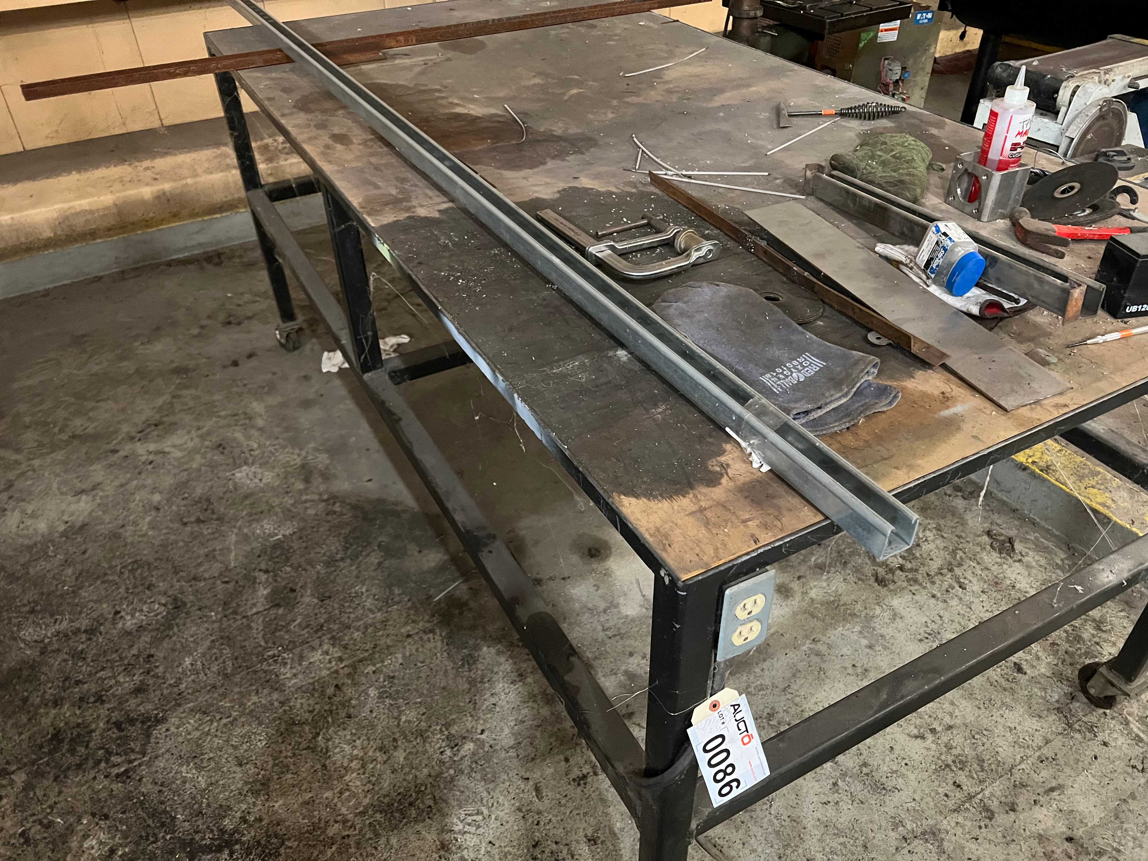 STEEL TABLE WITH ROLLERS AND ELECTRICAL OUTLET - MATERIAL HANDLING