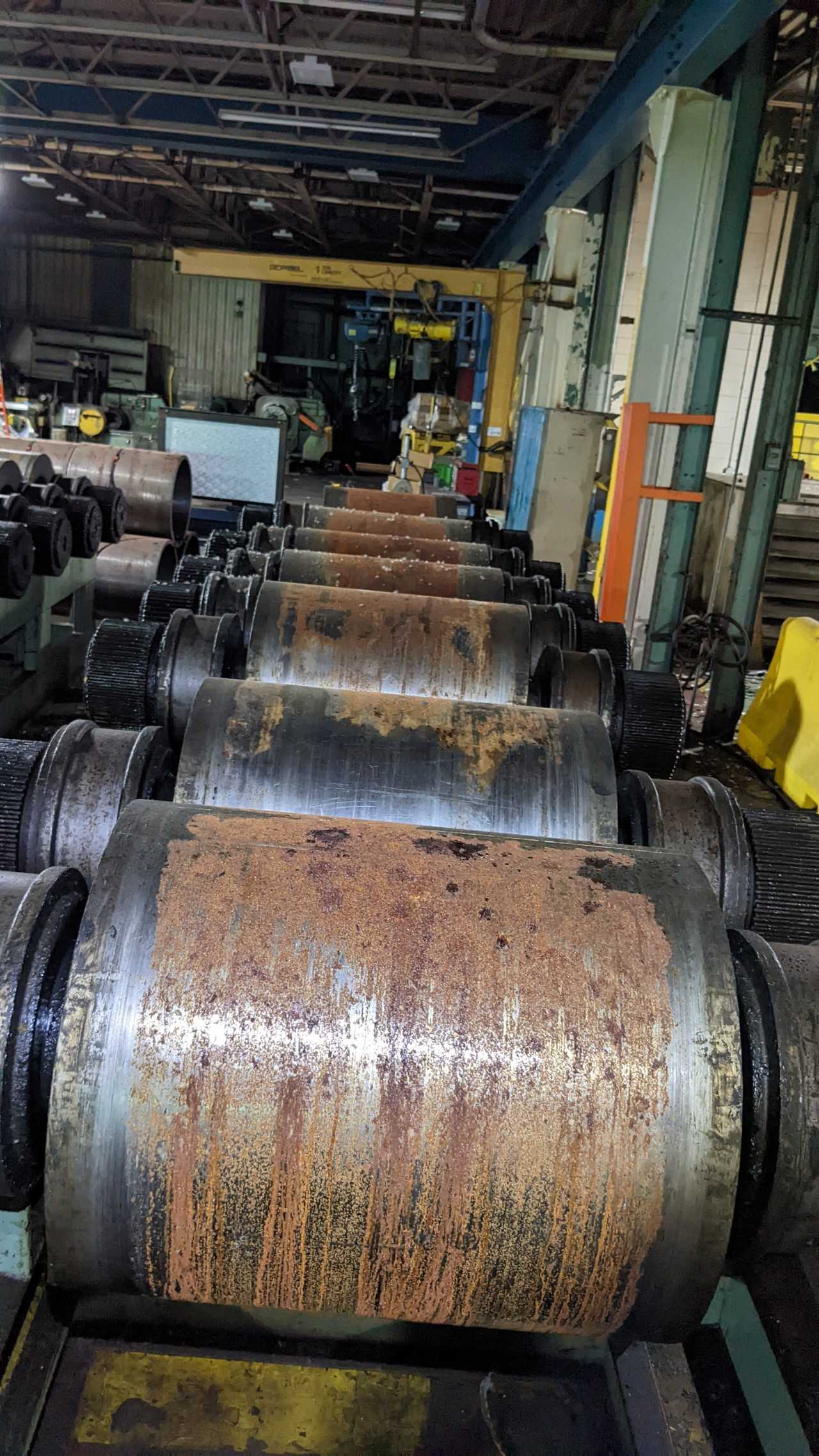 Lot of 7 steel rolls with rack Lot of 7 steel rolls with rack