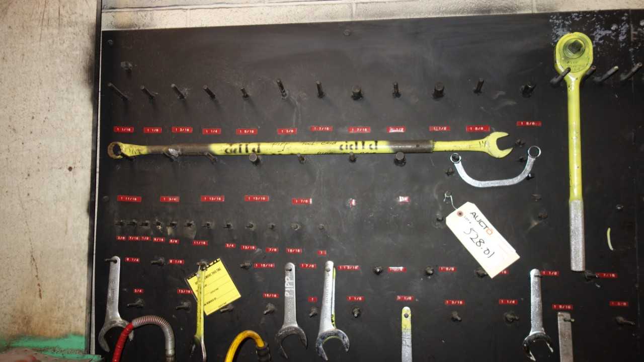 CONTENTS OF WALL, OPEN ENDED CRESCENT WRENCHES, SOCKET WRENCHES, SOCKETS, AND EXTENSIONS - HAND TOOLS