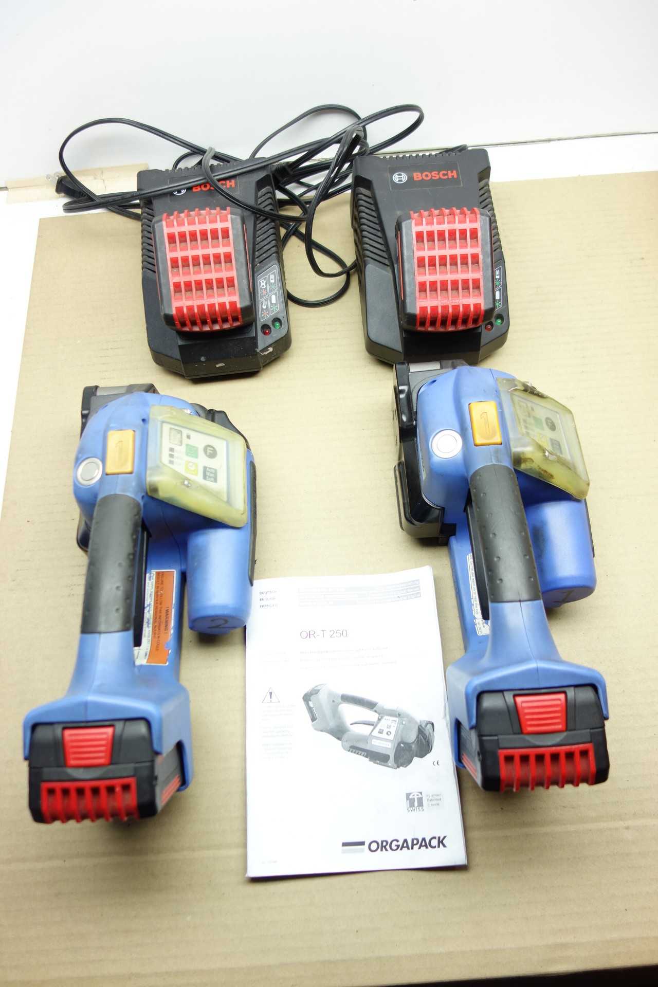 LOT OF 2 ORGAPACK BATTERY OPERATED HAND PLASTIC STRAPPING TOOL WITH BOSCH BATTERY CHARGERS - ELECTRICAL COMPONENTS