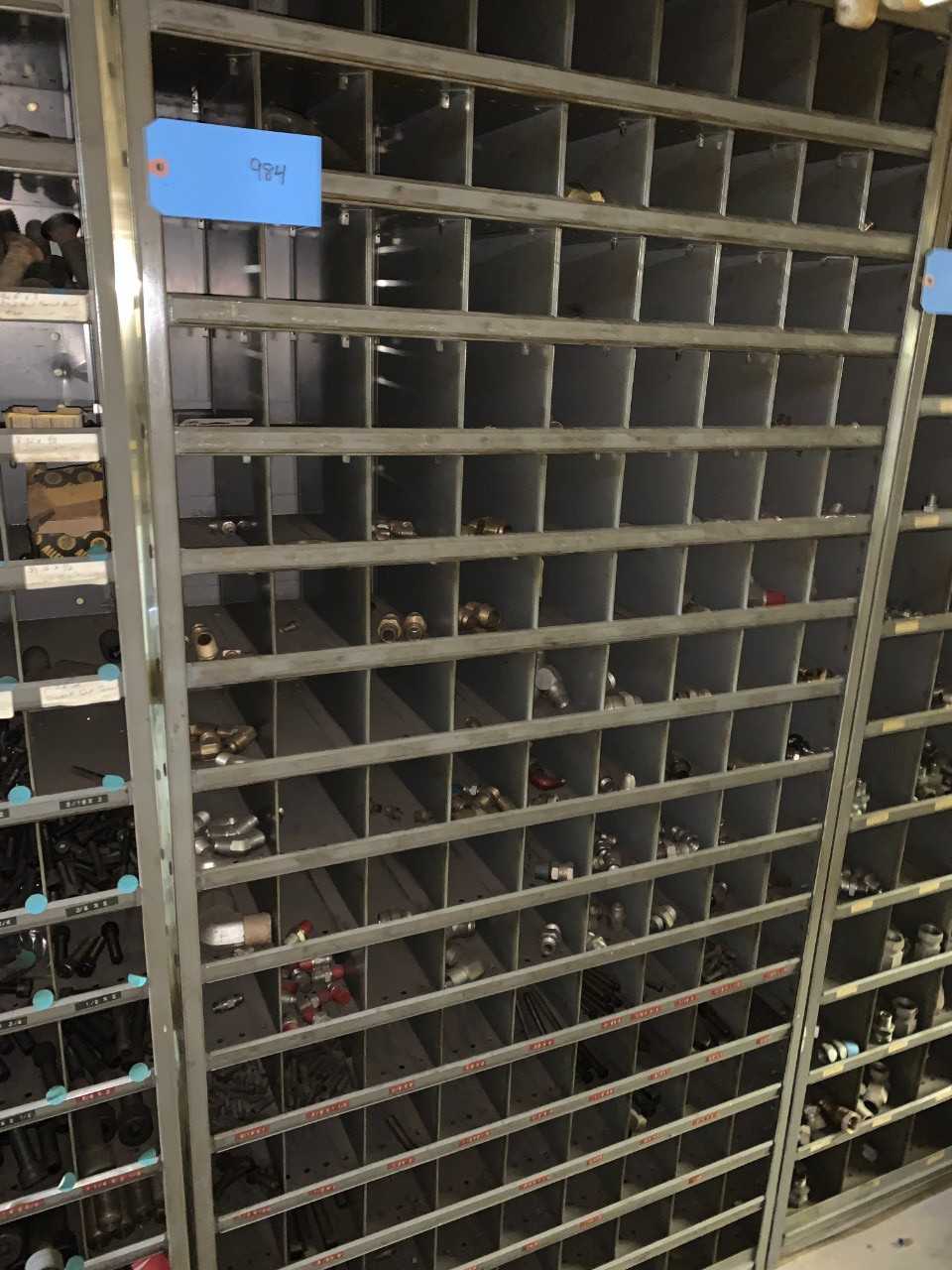 Large wall unit filled with fittings - INDUSTRIAL PARTS