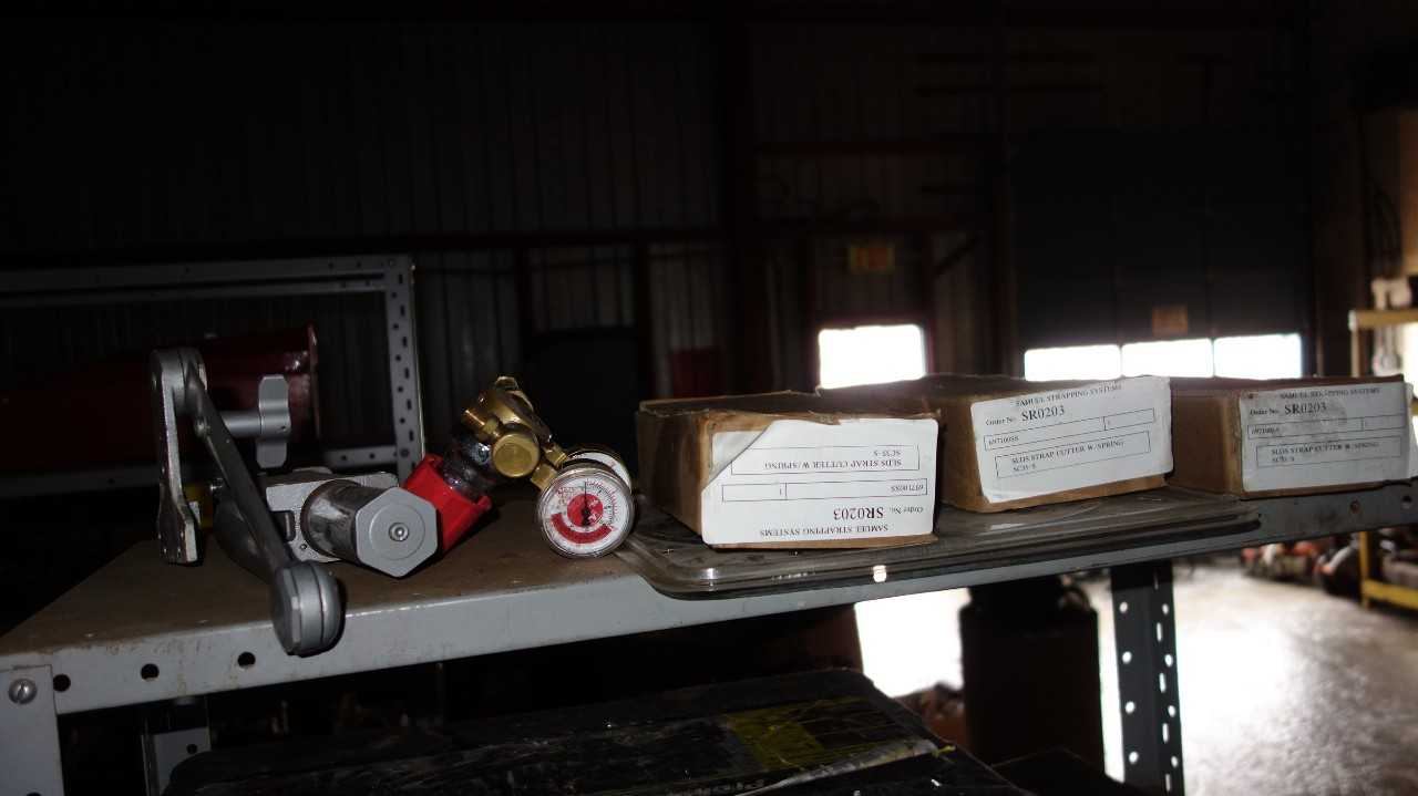 CONTENTS OF SHELF - INCLUDES 3X SC-35S SAMUEL STRAPPING SYSTEMS STRAP CUTTERS - ELECTRIC POWER TOOLS