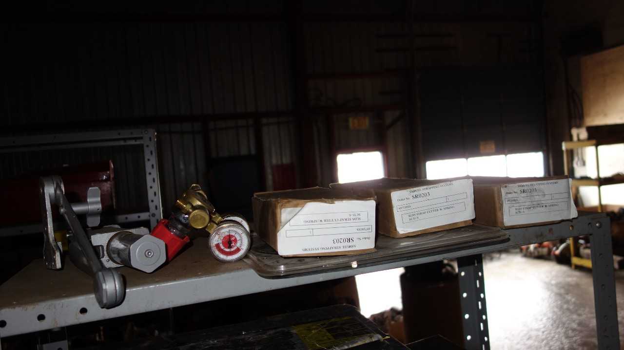 CONTENTS OF SHELF - INCLUDES 3X SC-35S SAMUEL STRAPPING SYSTEMS STRAP CUTTERS - ELECTRIC POWER TOOLS