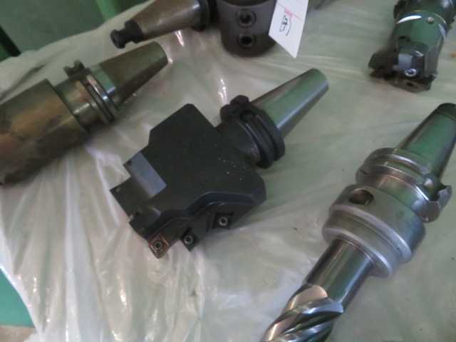 7	Various CAT40 Tools with Tool Holders  LOT - MISCELLANEOUS