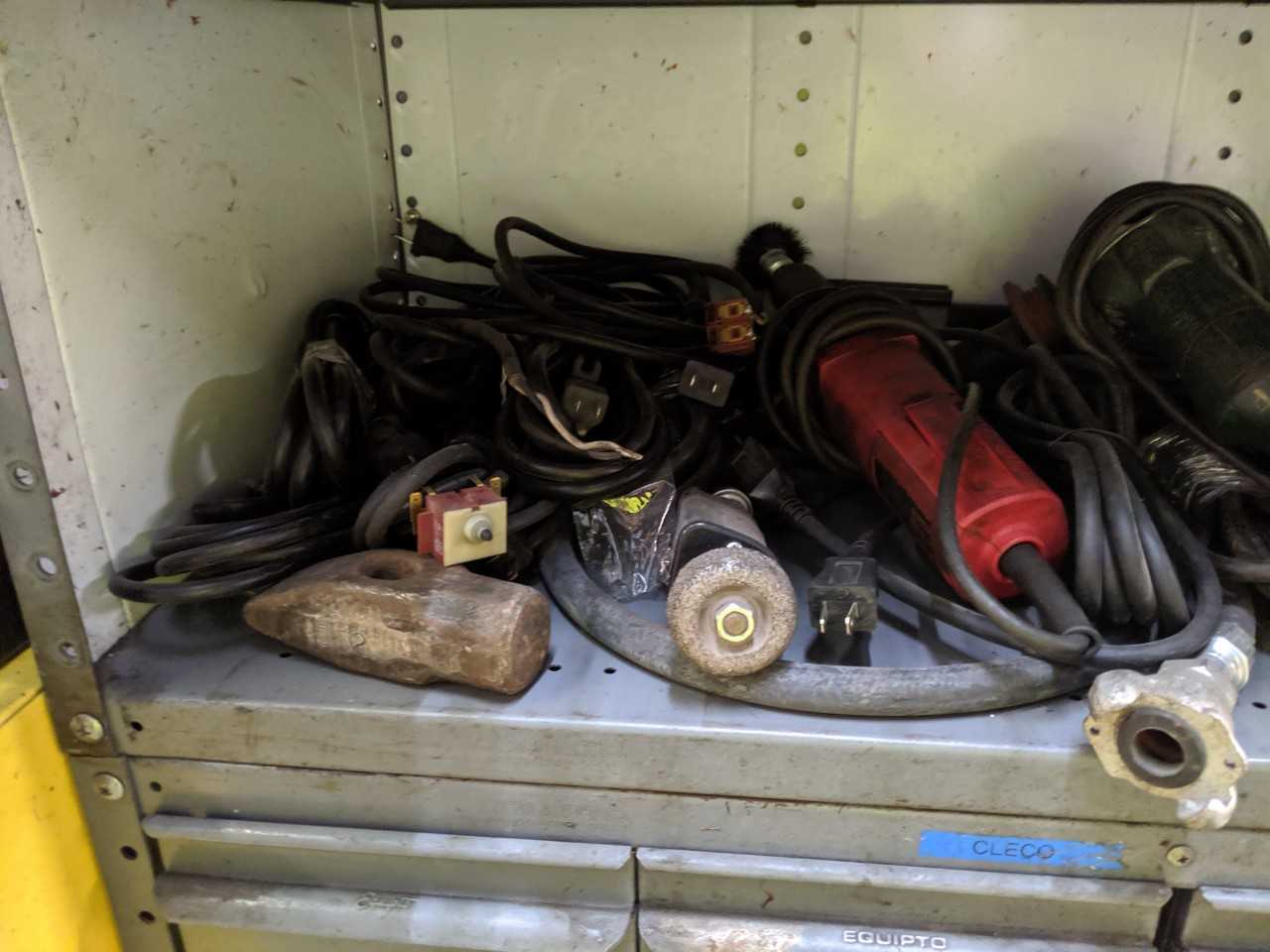 Pigeon-hole shelving with power and air tool parts, soldering gun parts - ELECTRIC POWER TOOLS
