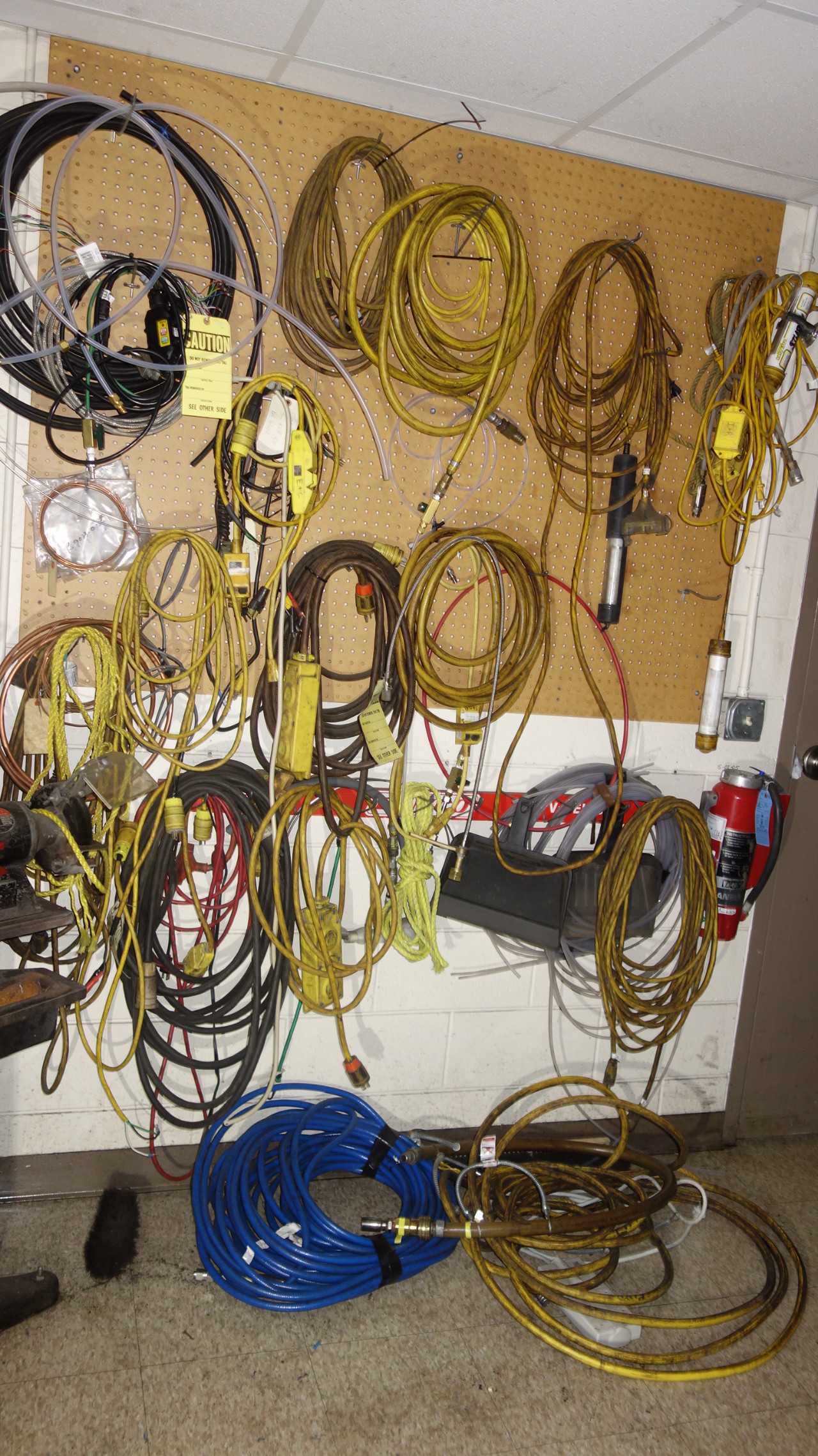 CONTENTS OF WALL SECTION, ASSORTED CABLES, HOSES - INDUSTRIAL PARTS