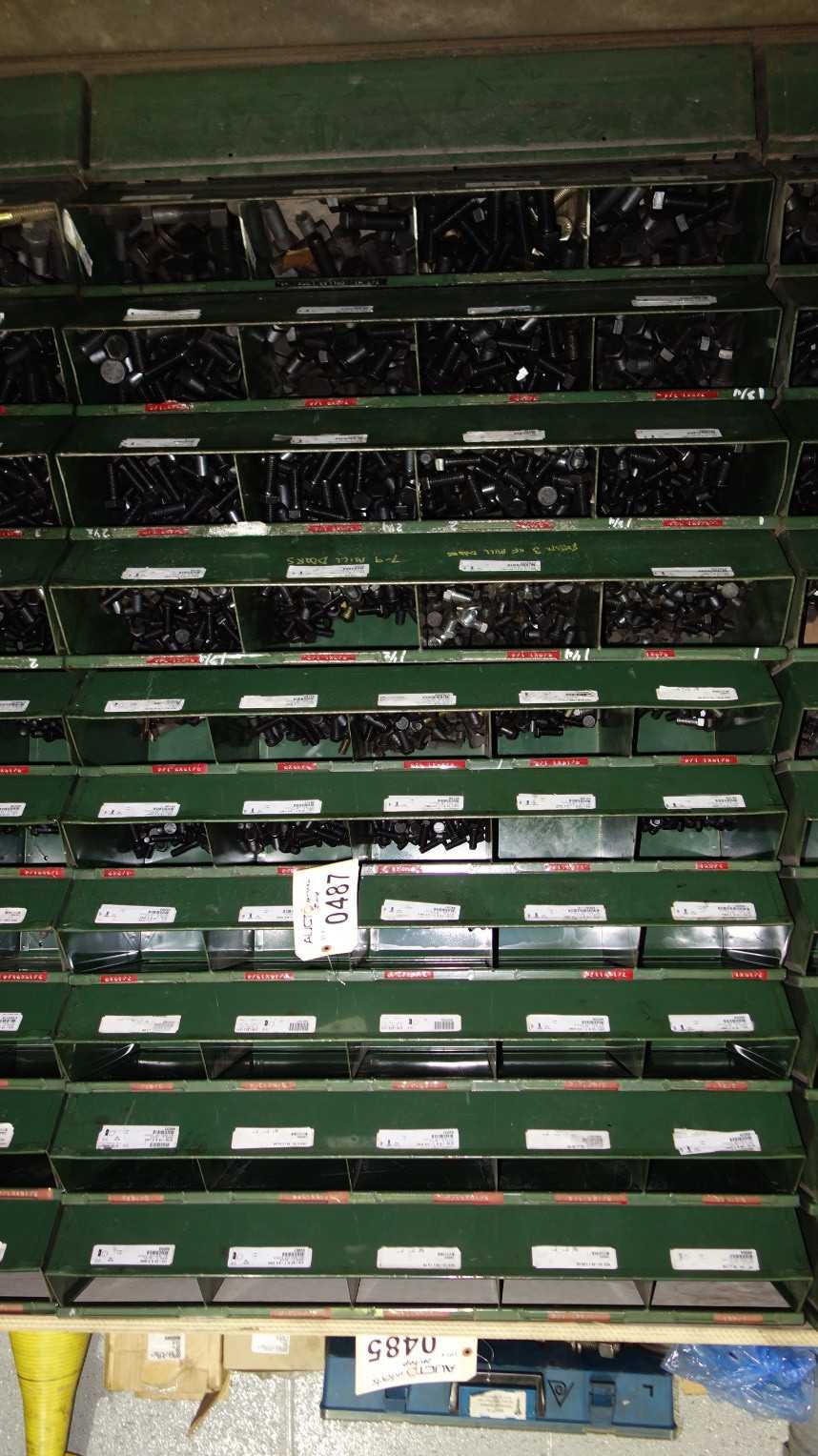 SHELVES OF ASSORTED THREADED SCREWS AND NUTS - INDUSTRIAL PARTS