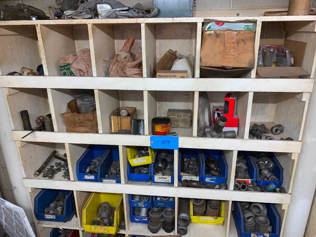 Organizer full of Pipe fittings - INDUSTRIAL PARTS