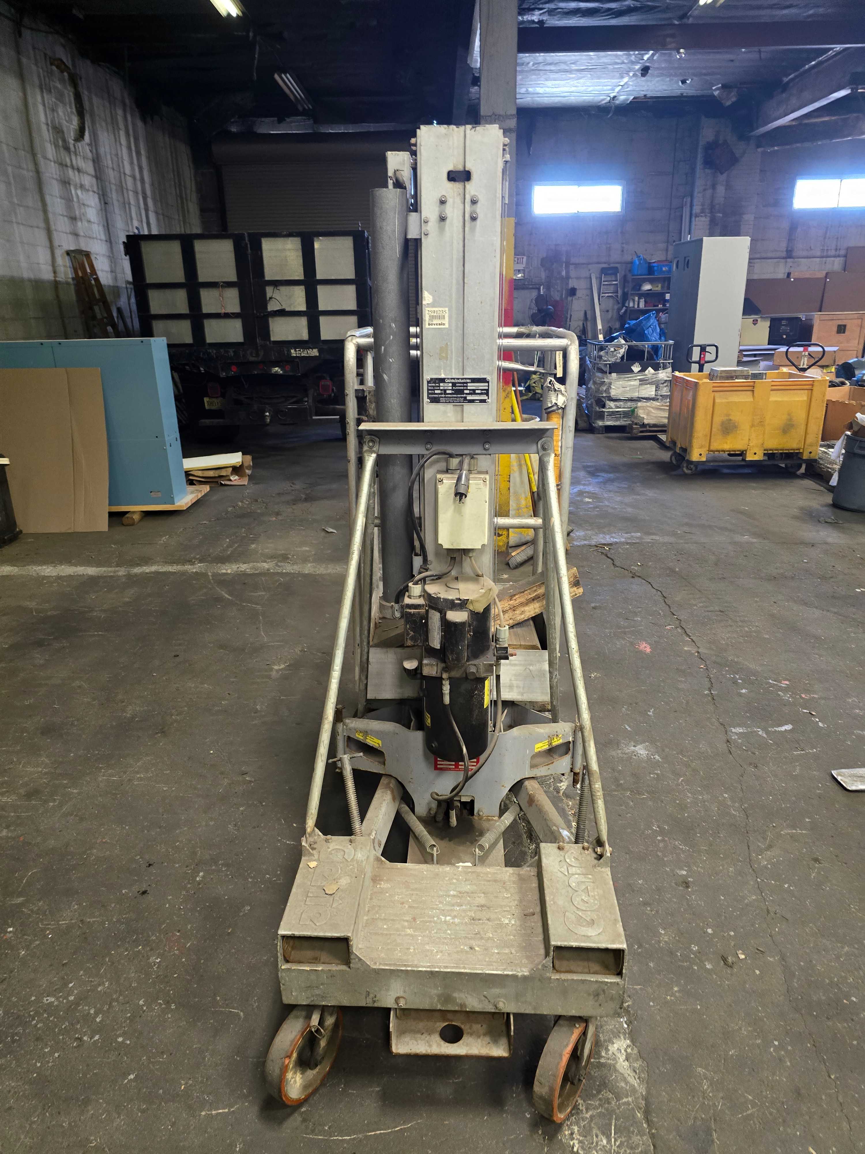 GENIE ONE MAN PERSONNEL LIFT - MATERIAL HANDLING EQUIPMENT