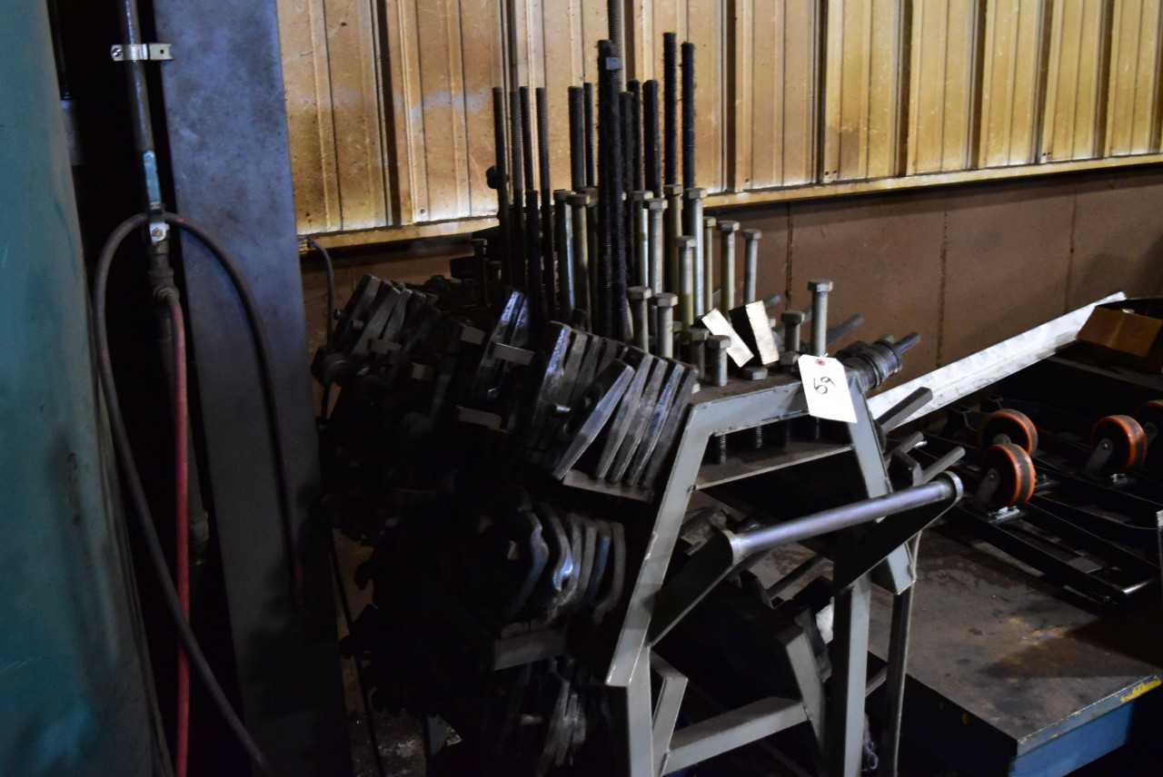 Rack of Misc. Die Tie Downs - ELECTRIC POWER TOOLS