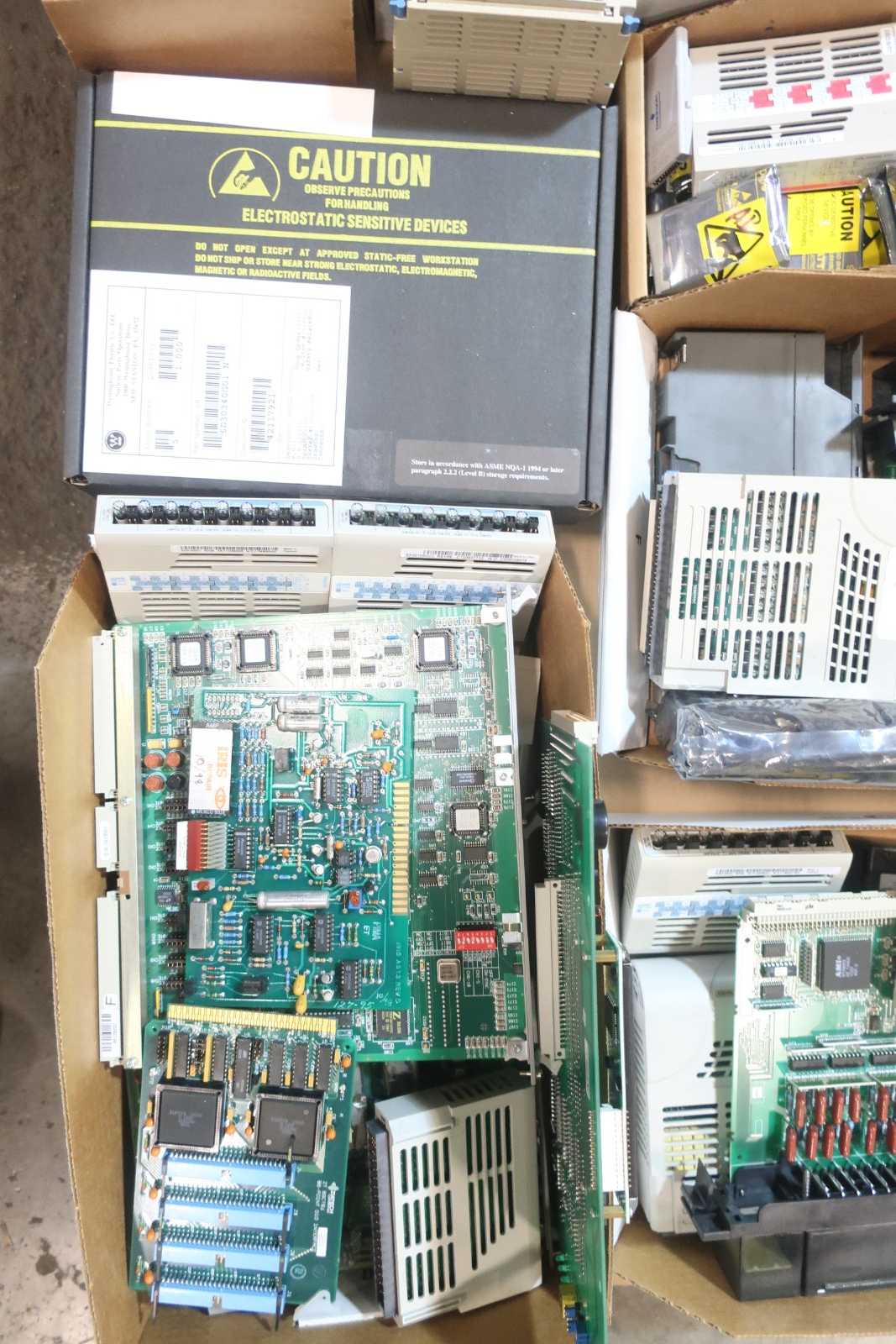 1 PALLET OF ASSORTED ELECTRICAL CIRCUIT BOARDS, MODULES, POWER SUPPLY CONTROLS, AMP RACKS, SERVO DRIVE- WESTINGHOUSE, FISHER ROSEMOUNT, EMERSON, GOULD, BLACKBOX, ALLEN BRADLEY - AUTOMATION & CONTROLS