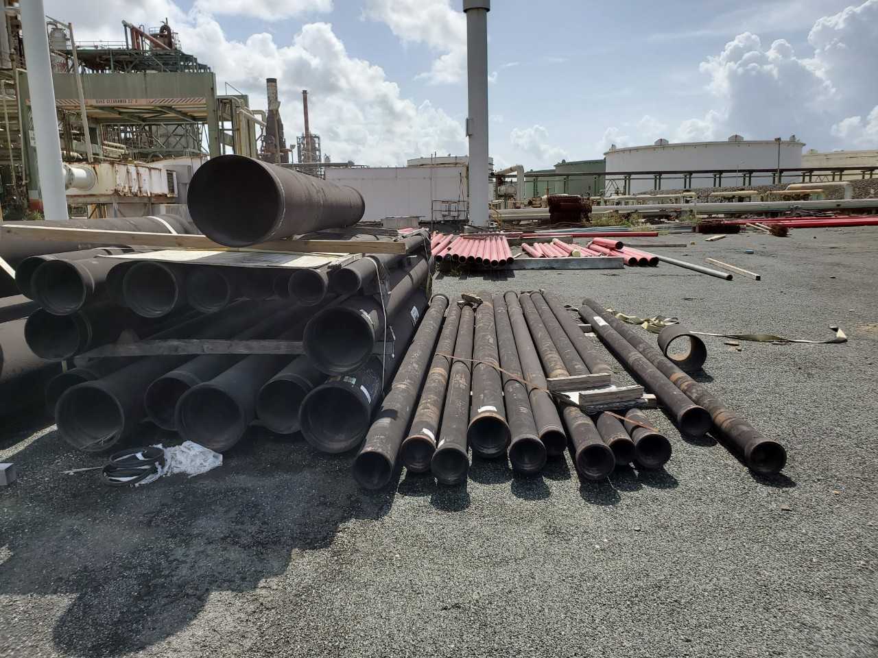 ROW OF ASSORTED US PIPE TYTON JOINT DUCTILE IRON PIPES, 6IN, 8IN, 10IN, 16IN, 18IN, 20IN, 24IN, 30IN - HAND TOOLS