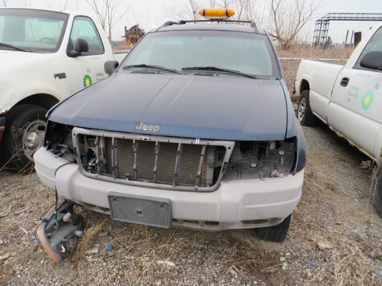 2000 JEEP GRAND CHEROKEE LAREDO 4WD 4 DOOR V6 CYL GAS JEEP  VIN:  1J4GW48S0YC231687 - BUSES