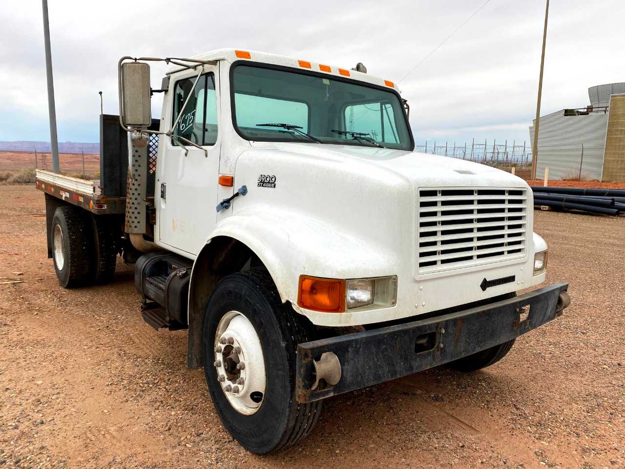 1999 International 4900 4X2 Cab Stake Bed Truck - HYDRO EXCAVATOR TRUCKS