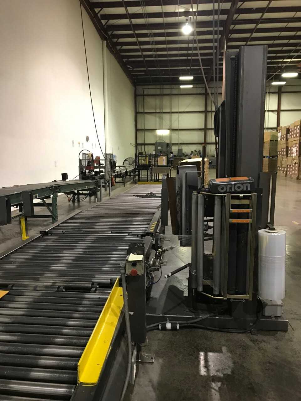 Fully Automatic Stretch wrapper with 15 ft powered infeed & rollers - PACKAGING