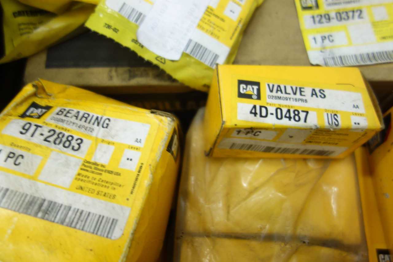 PALLET OF ASSORTED CAT HEAVY EQUIPMENT REPLACEMENT PARTS - CONSTRUCTION