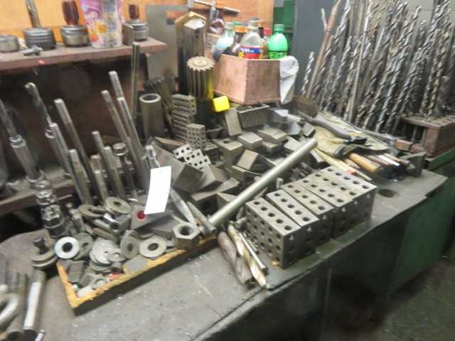 All items in pictures and contents of table and racks, except grinder - MISCELLANEOUS