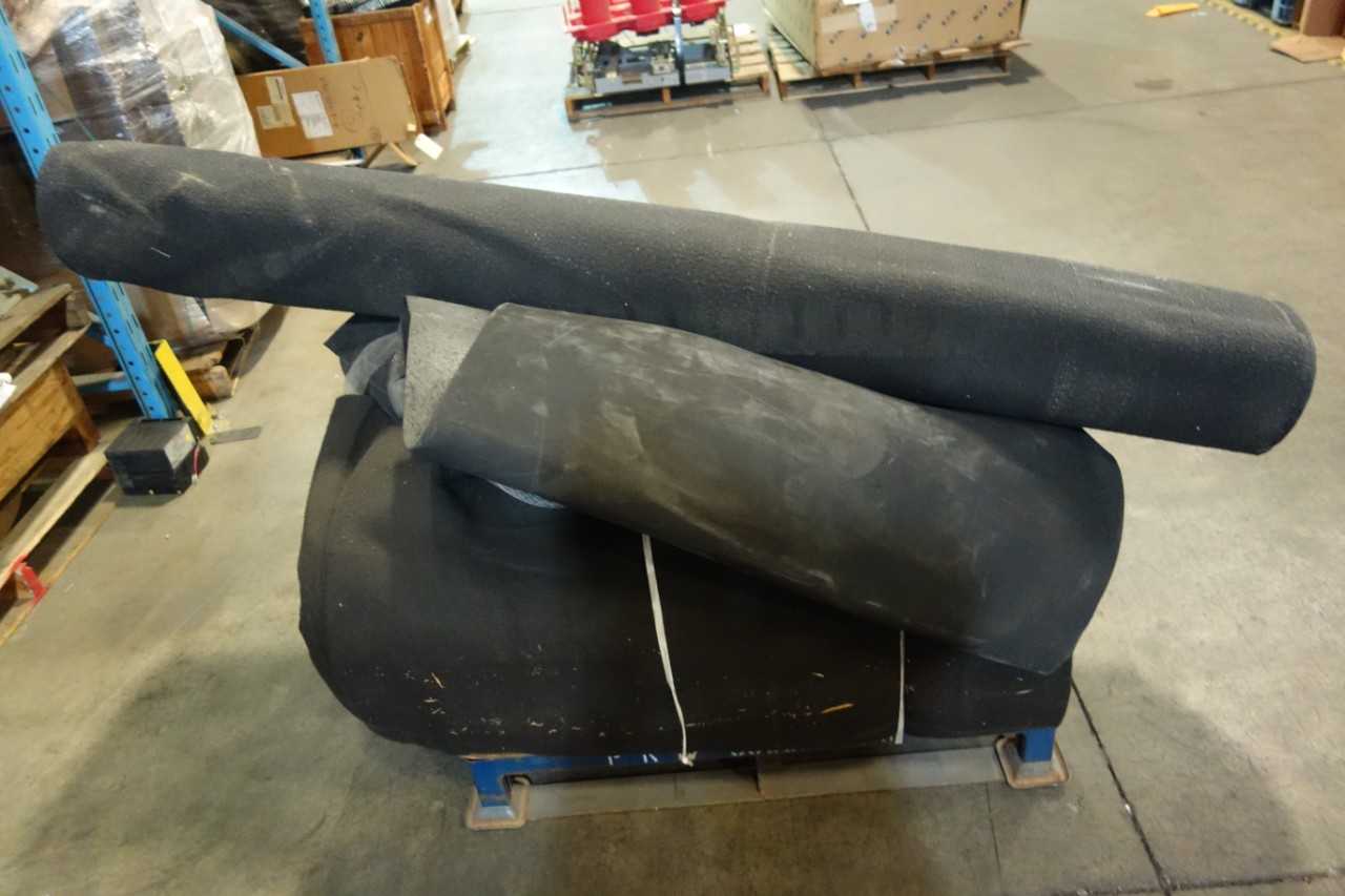 1 PALLET OF ASSORTED RUGS AND TARPS  STEEL PALLET NOT INCLUDED - MATERIAL HANDLING
