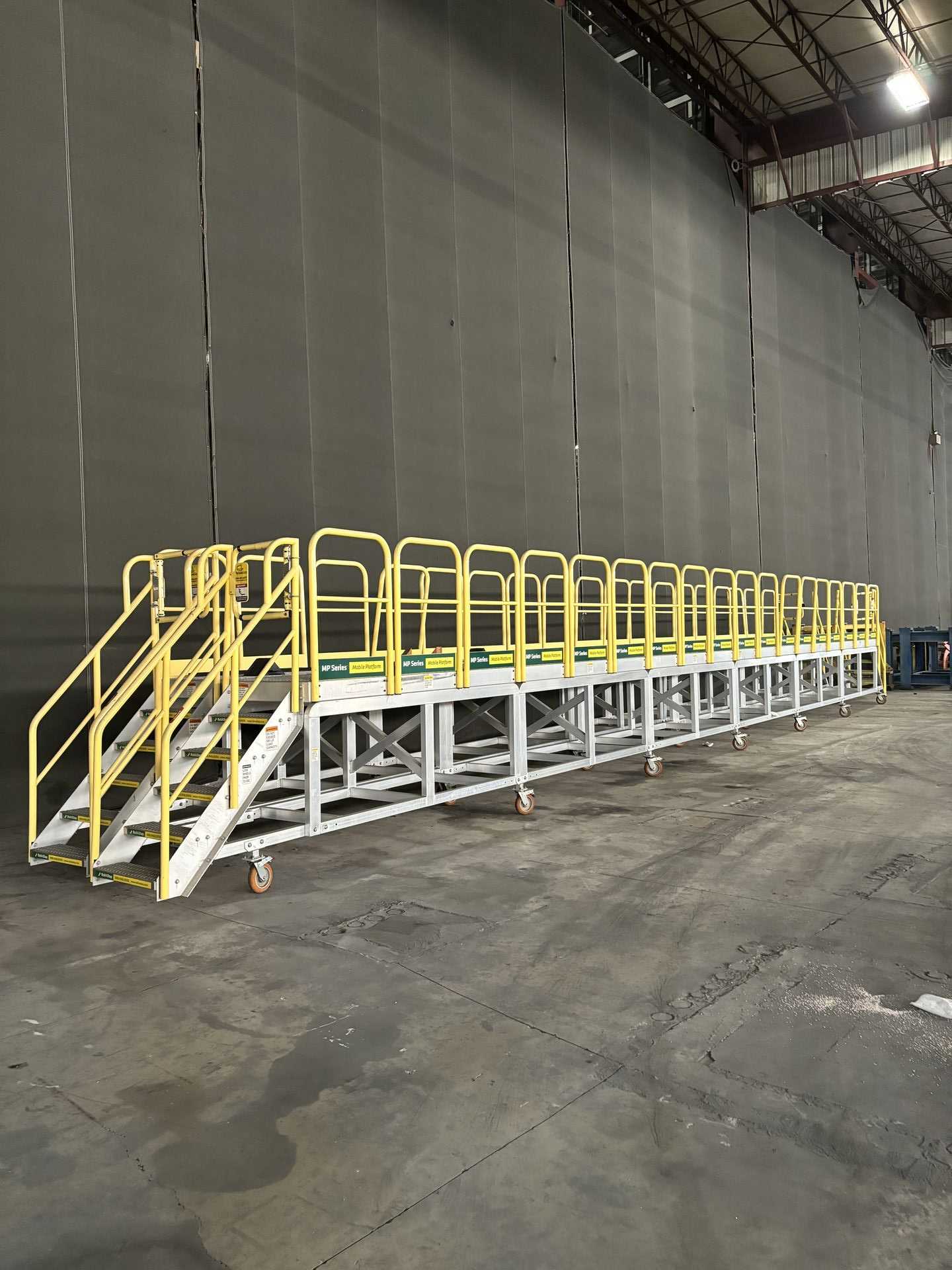 PAIR OF ROLLASTEP 40' MOBILE PLATFORMS - PLANT & FACILITY PAIR OF ROLLASTEP 40' MOBILE PLATFORMS - PLANT & FACILITY