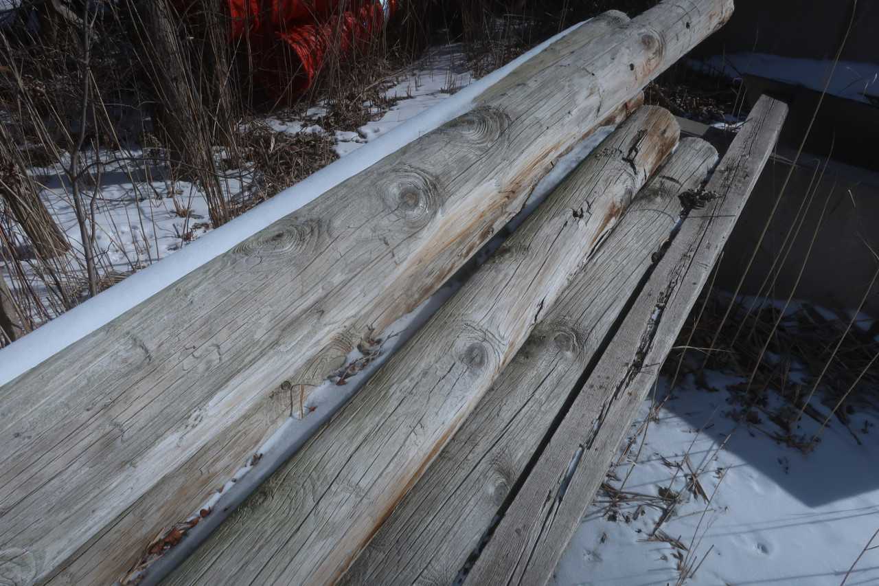 LOT OF ASSORTED TELEPHONE POLES - TRAILER MOUNTED EQUIPMENT