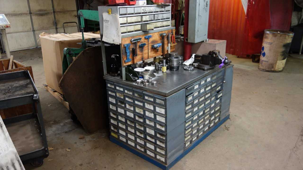STRIPPIT PRESS PUNCHES & DIES WORK STATION, FULL SET OF PUNCHES AND DIES IN CABINET (DOES NOT INCLUDE TABLE VISE)