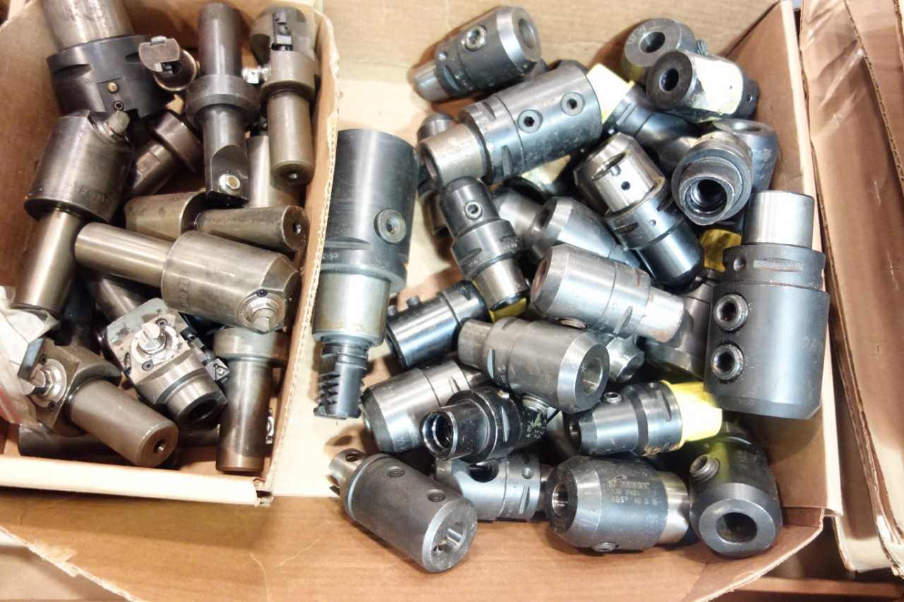 1 PALLET ASSORTED GRINDER WHEELS, SAND BELTS, CHUCKS, DRILL BITS, BORE SLIDES- SANDVIK, KENNAMETAL, NORTON - GRINDING MACHINES