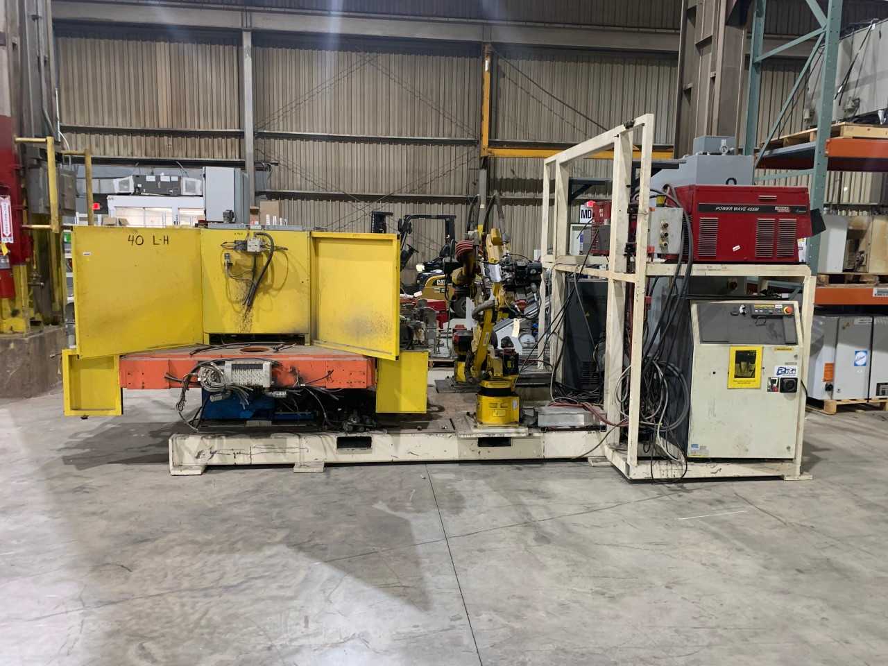 DUAL WELDING CELL W/ 100IB FANUC ROBOTS AND RJ3IB CONTROLLERS - INDUSTRIAL ROBOTS