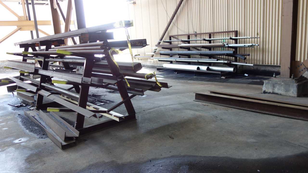ASSORTED FLAT AND ROUND STEEL STOCK WITH RACKING - PALLET RACKING