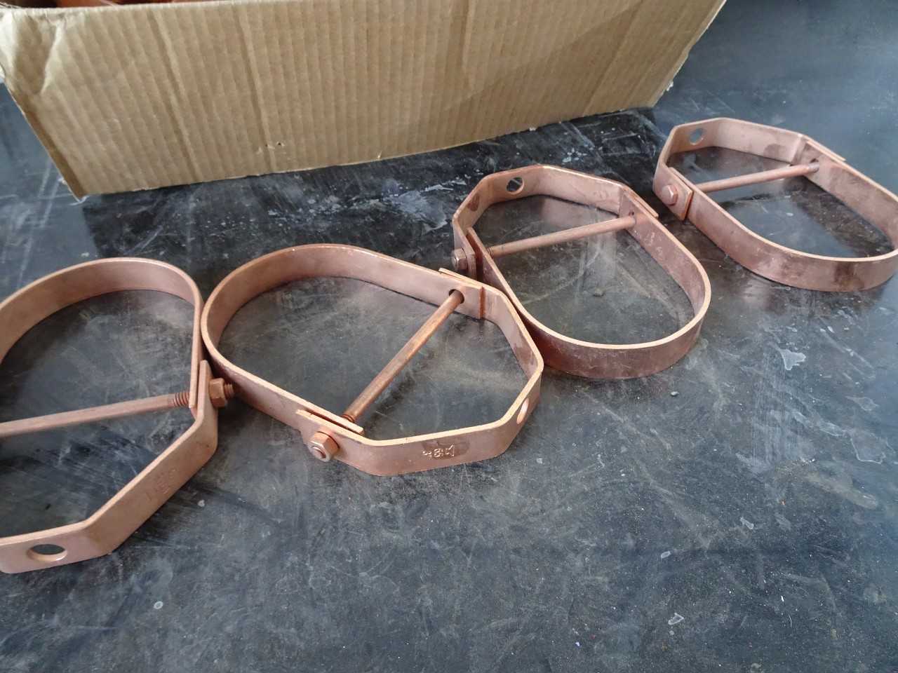 Appox 25 3in copper pipe hangers - WIRE MANUFACTURING