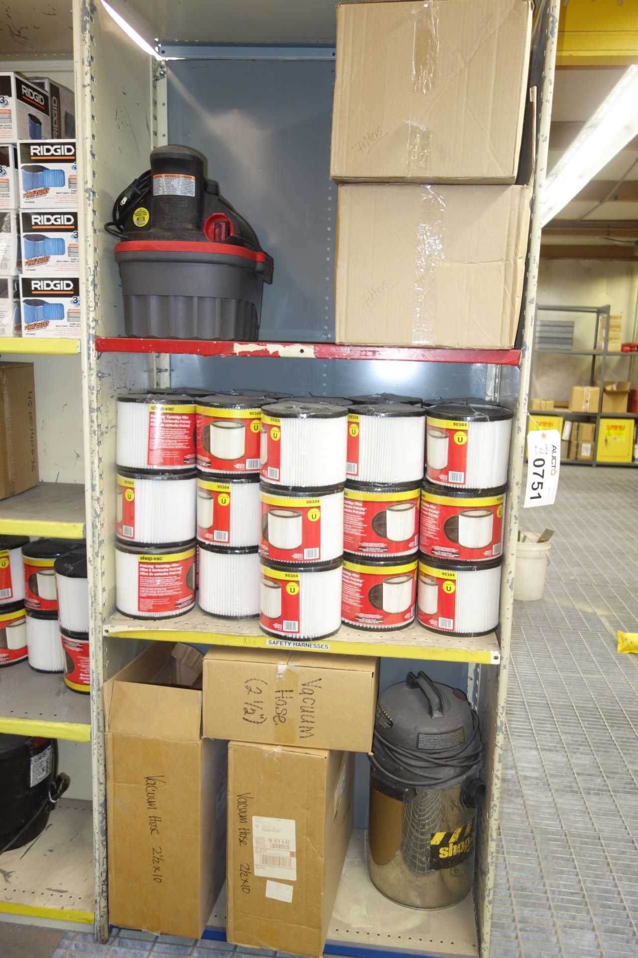 Contents of 2x sections shelving - vacuums, vacuum air filters - SHELVING